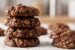 4 ingredient chocolate peanut butter no bake cookies stacked with oats and chocolate