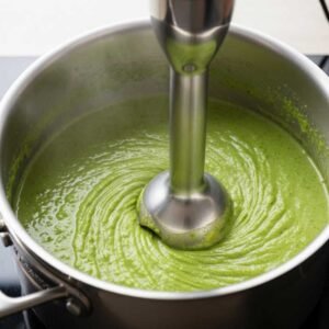 Keto Broccoli Cheese Soup Without Heavy Cream Recipe 11 blending broccoli soup until smooth and creamy