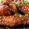 Korean sticky wings with glossy spicy sauce